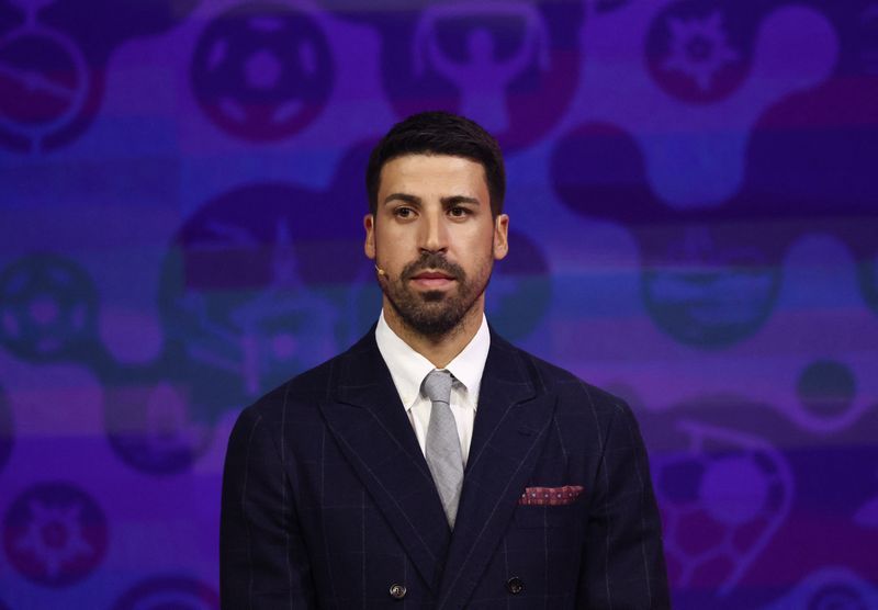 Two Flags, One Heart: Khedira Embraces Brothers Playing for Different Nations at World Cup