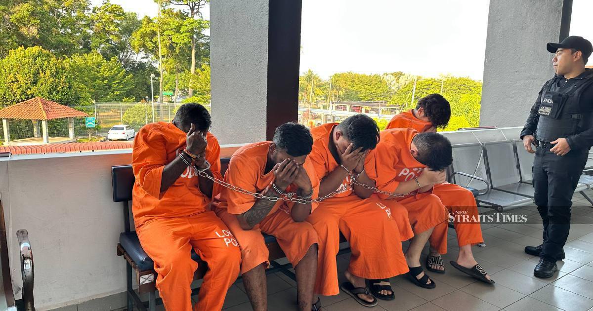 Four men charged over businessman's death in Johor river