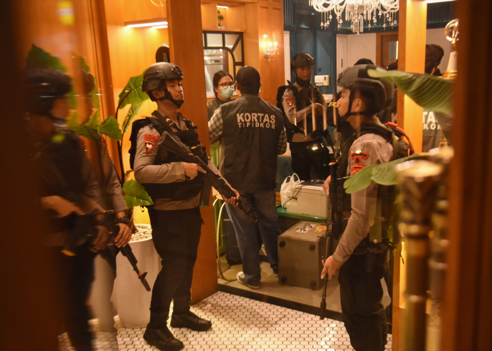 Jakarta's biggest graft scandal in years: deputy attorney general surrenders amid raids on luxury homes, cafes