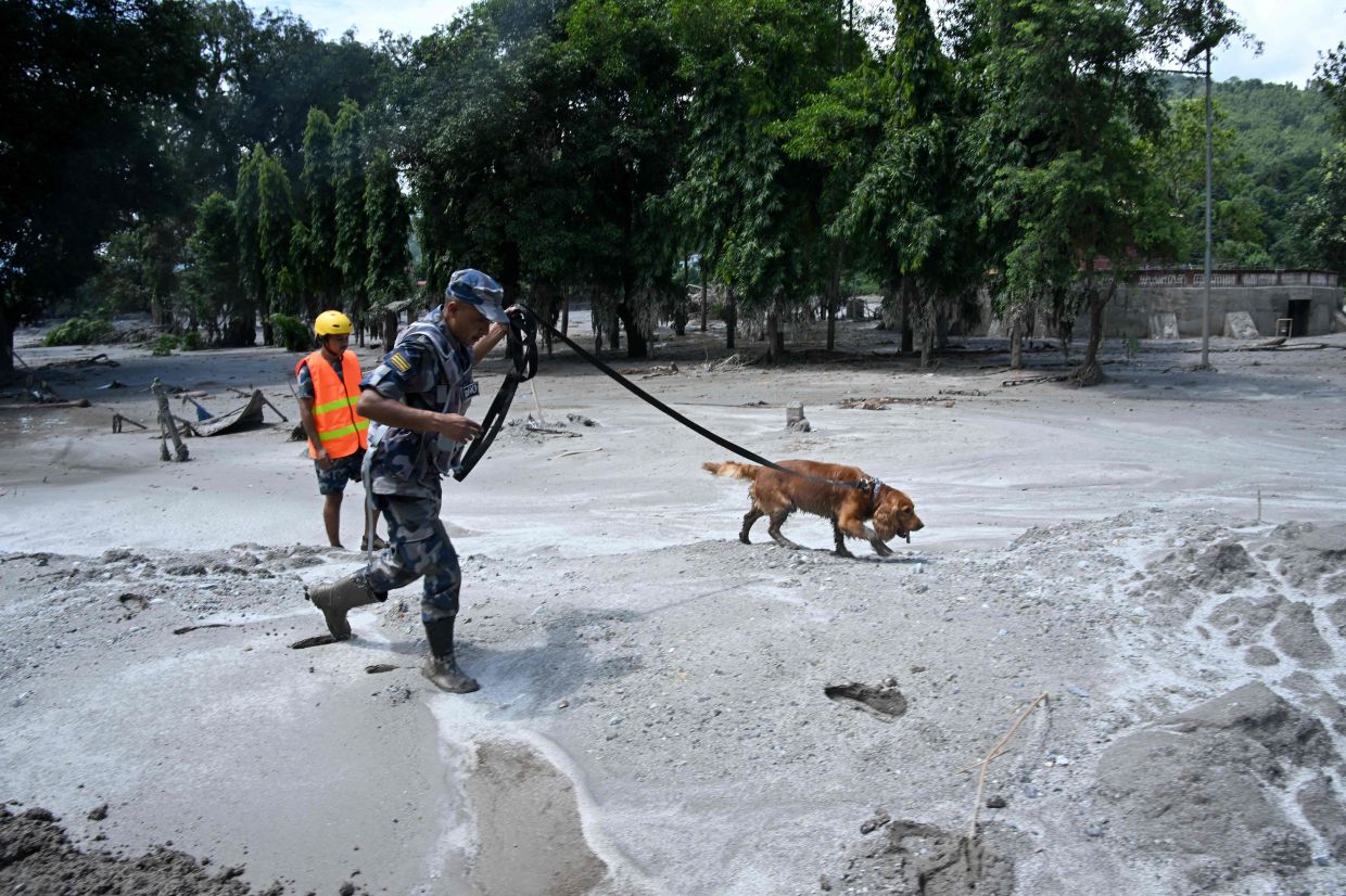 More than 1,400 missing after devastating Nepal-Tibet border floods kill 392