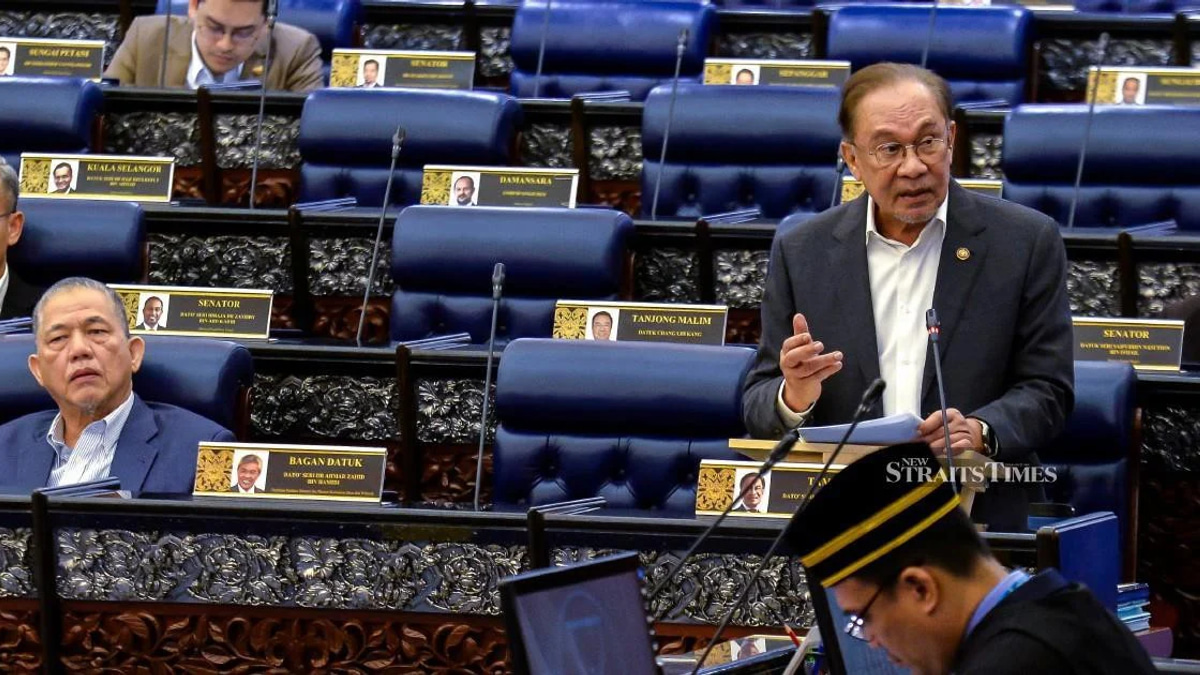 E-wallet Companies Must Compensate Fraud Victims Within a Week, Says Anwar