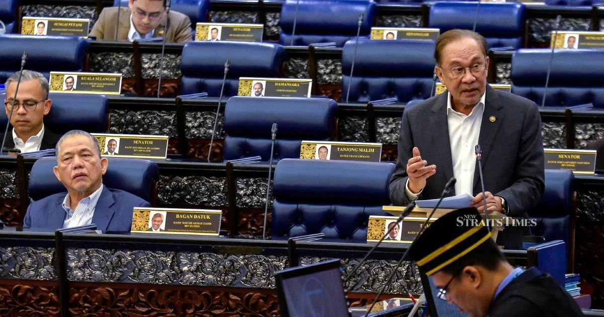 E-wallet Companies Must Compensate Fraud Victims Within a Week, Says Anwar