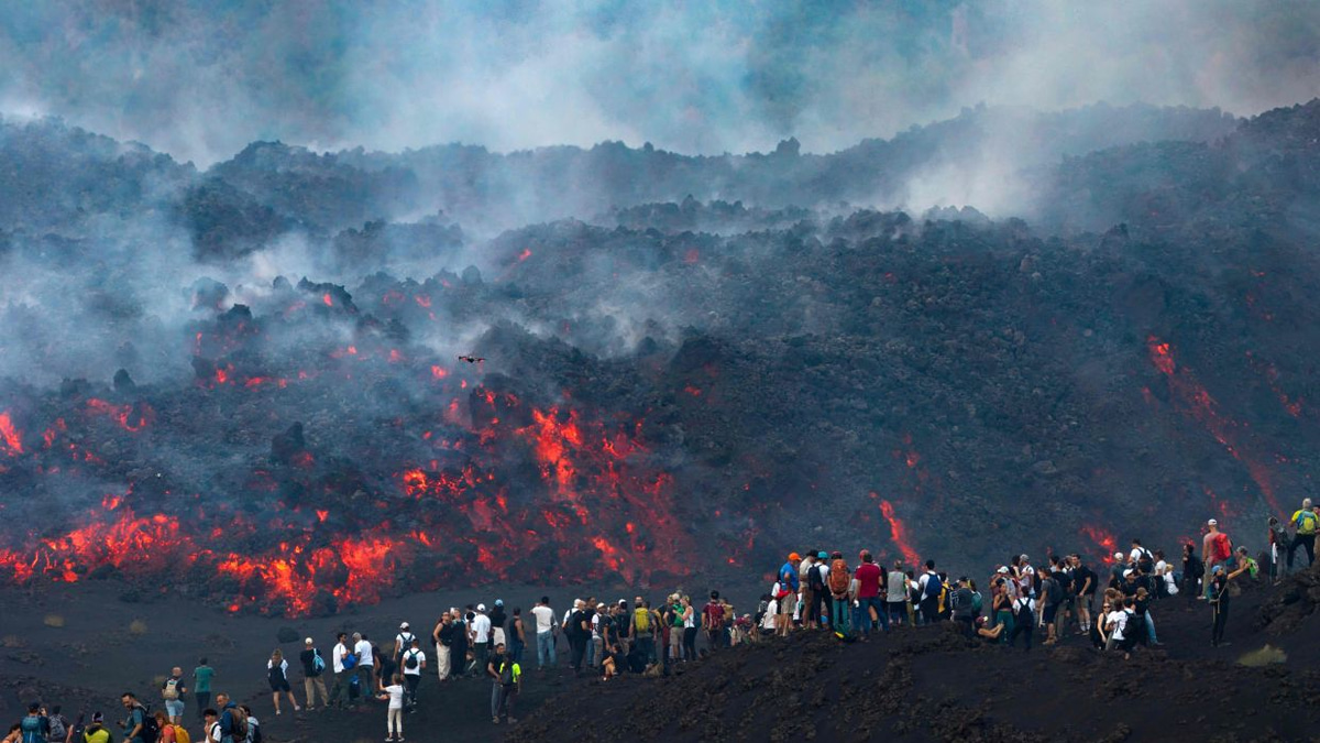 Europe's tallest volcano draws crowds despite eruption risks and airport chaos