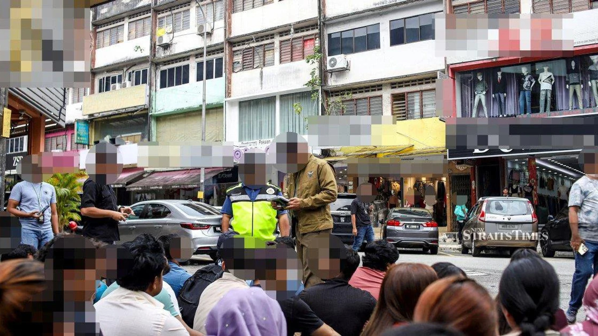 Immigration raid sweeps up 111 undocumented migrants from Jalan Kenanga wholesale district