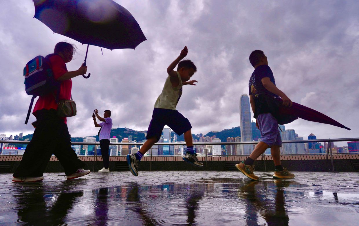 Rain brings relief to Hong Kong after record-breaking summer heat