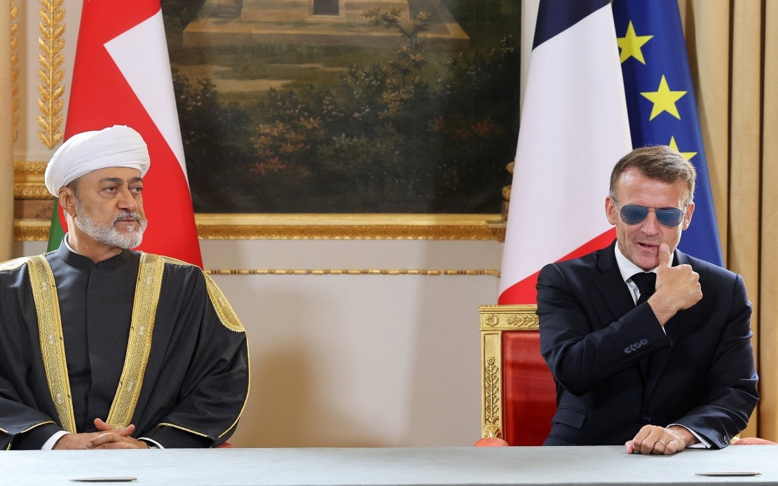 Macron's Aviators Return: French Leader Wears Signature Sunglasses to Oman Talks