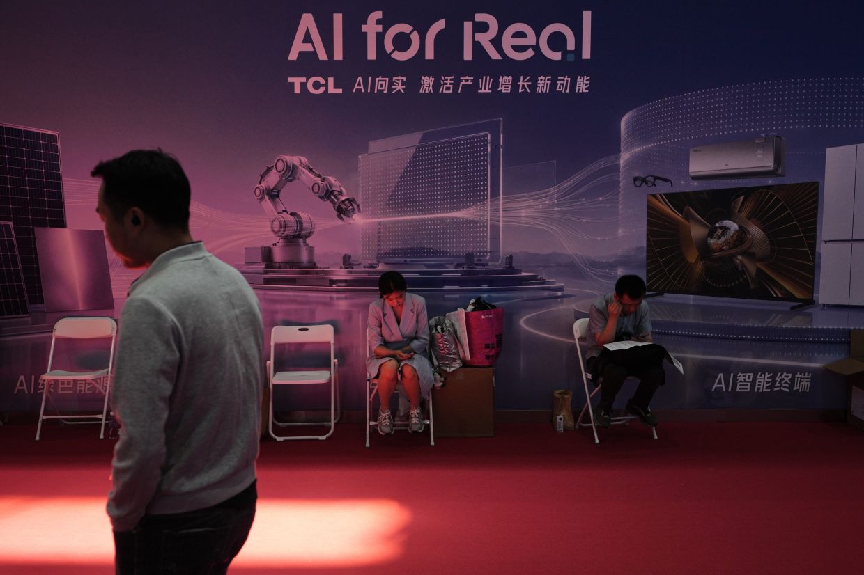 China's Workers Face Uncertain Future as AI Sweeps Through the Economy