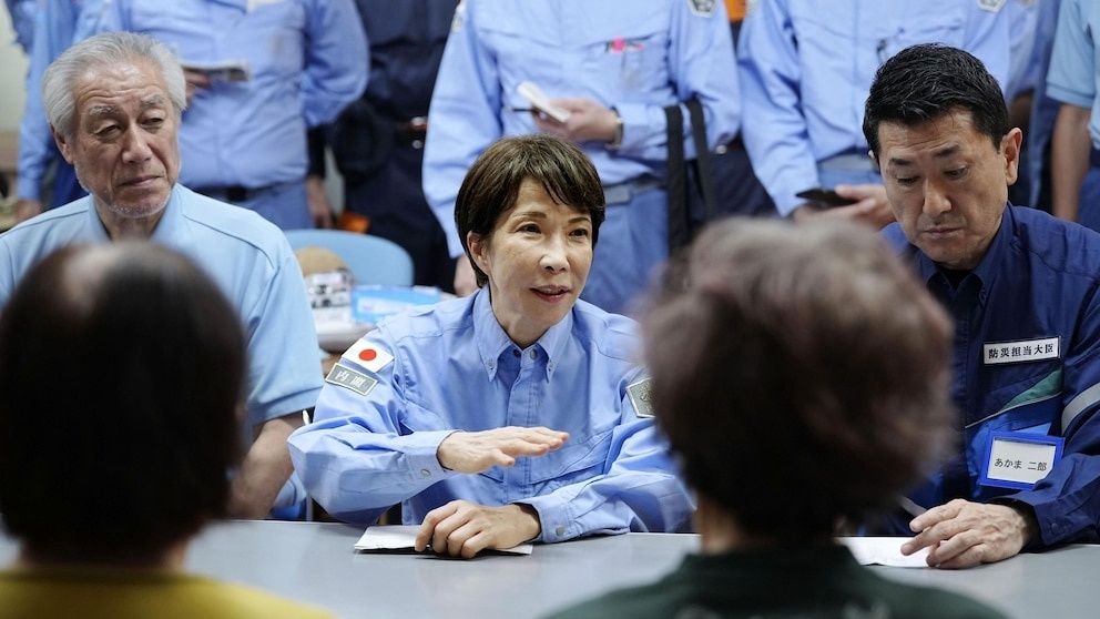 Japan's PM visits quake-stricken Kumamoto as heat and water shortages compound disaster relief crisis