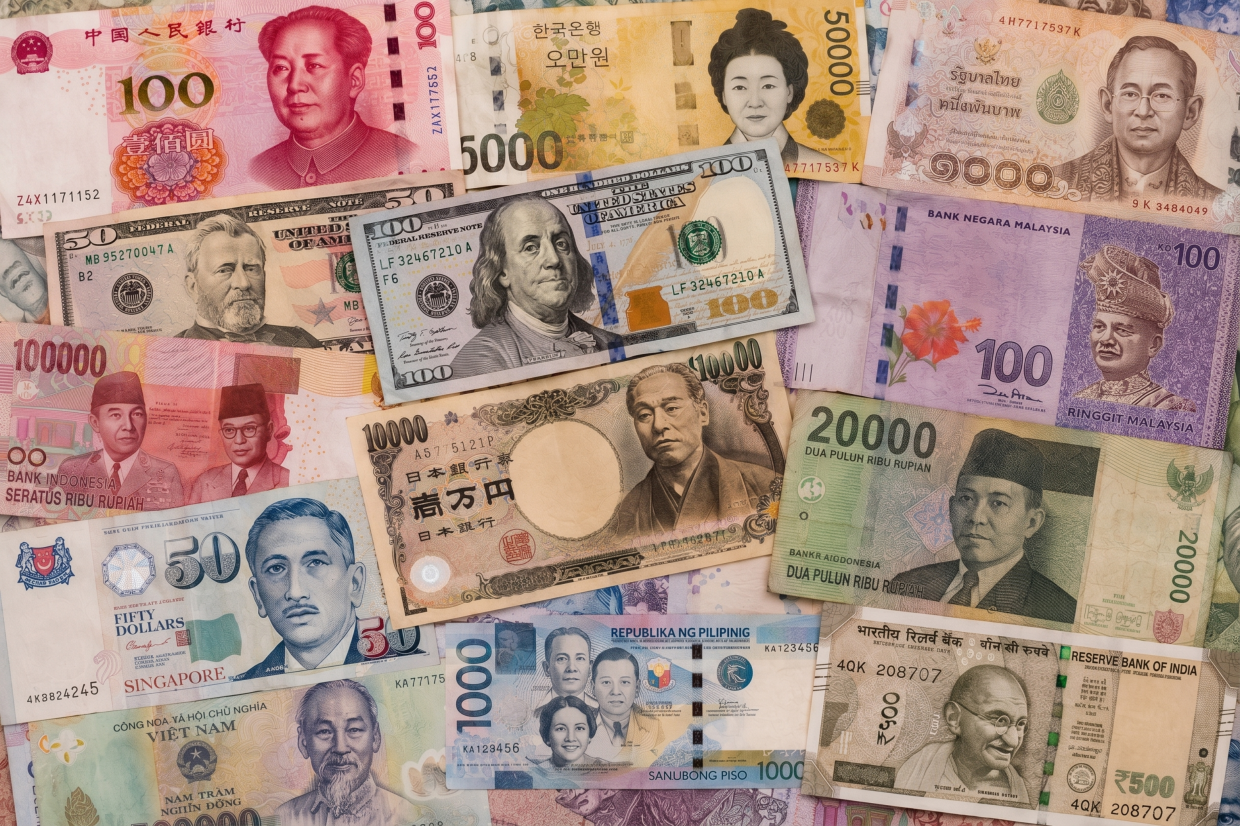 Asian Markets Tumble as Middle East Tensions Drive Oil Spike and Currency Weakness