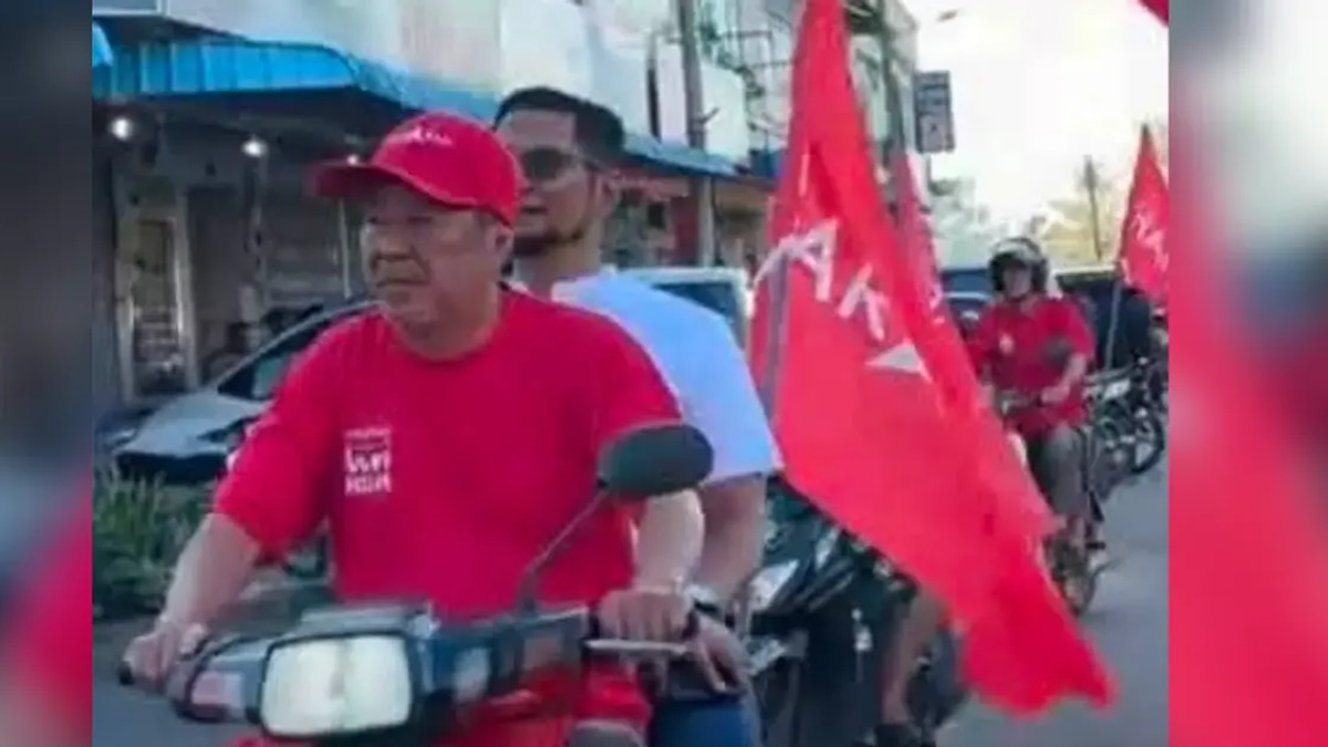 Transport Minister Loke Slams PKN Members for Flouting Helmet Laws