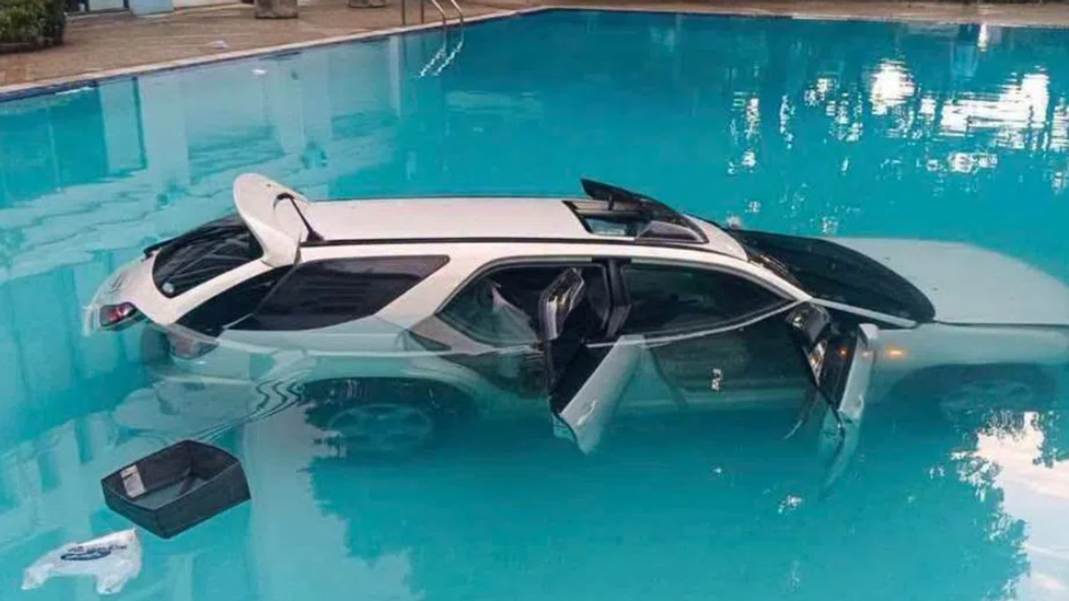 Thai man drives SUV into university pool over condo rent dispute with mother