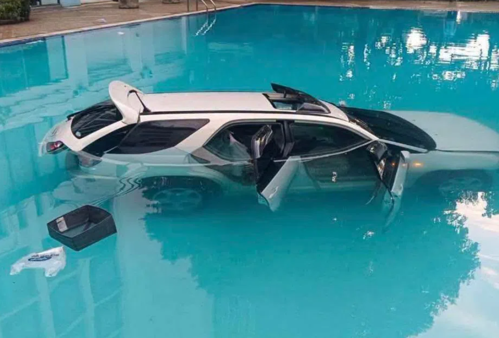 Thai man drives SUV into university pool over condo rent dispute with mother