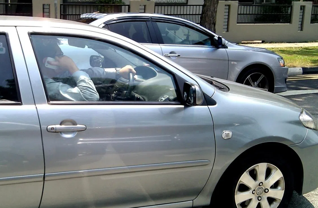 Singapore Tightens Road Laws: Phone Holding Ban and Harsher Penalties for Dangerous Driving