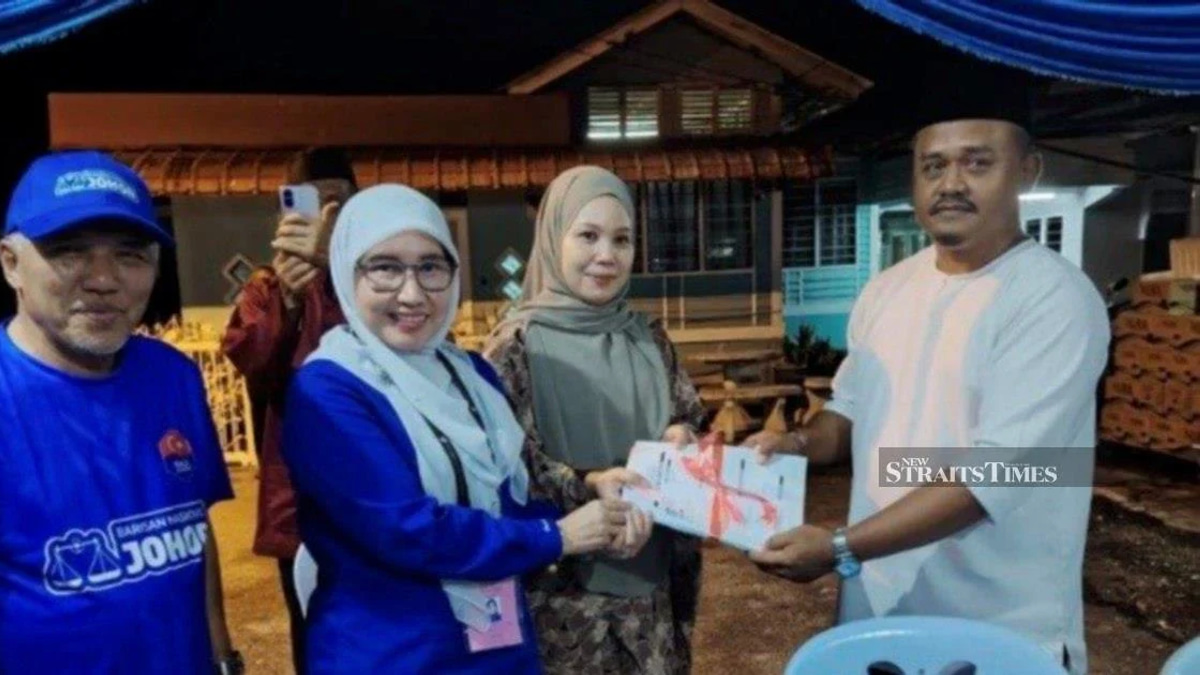 Defections Boost Umno Ahead of Johor Election as 200 Cross from Rival Parties