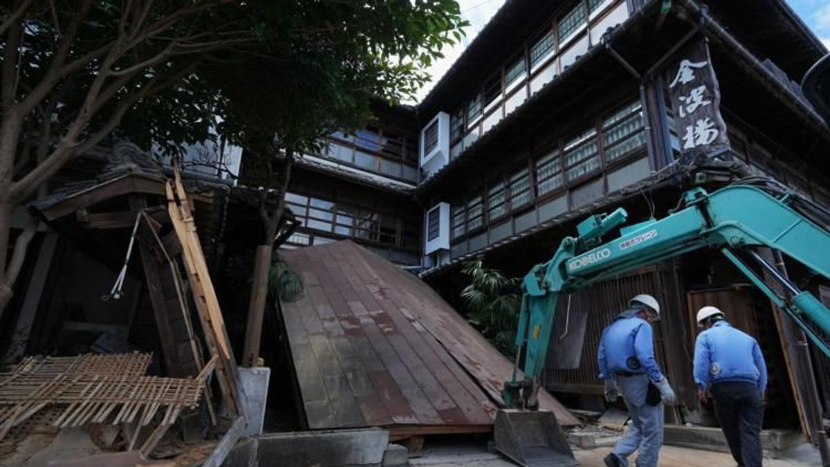 Heat stroke claims elderly woman sheltering in car as Japan quake death toll reaches 36