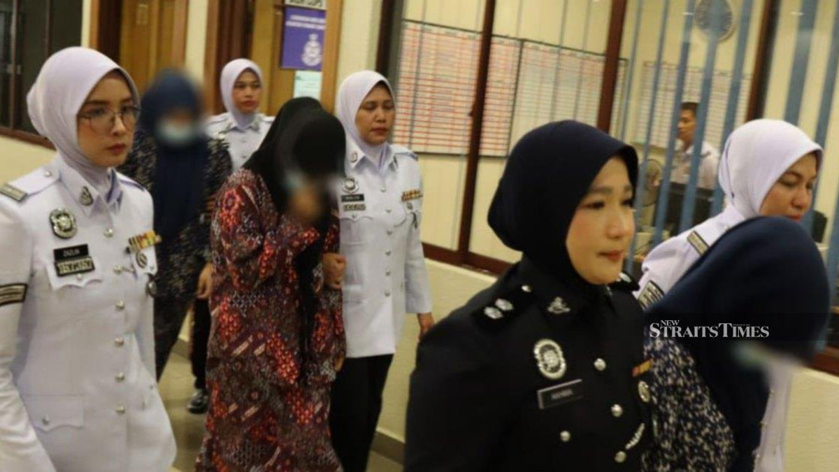 Three women, including teenagers, charged over dangerous 'Superman' motorcycle stunts in Kuantan