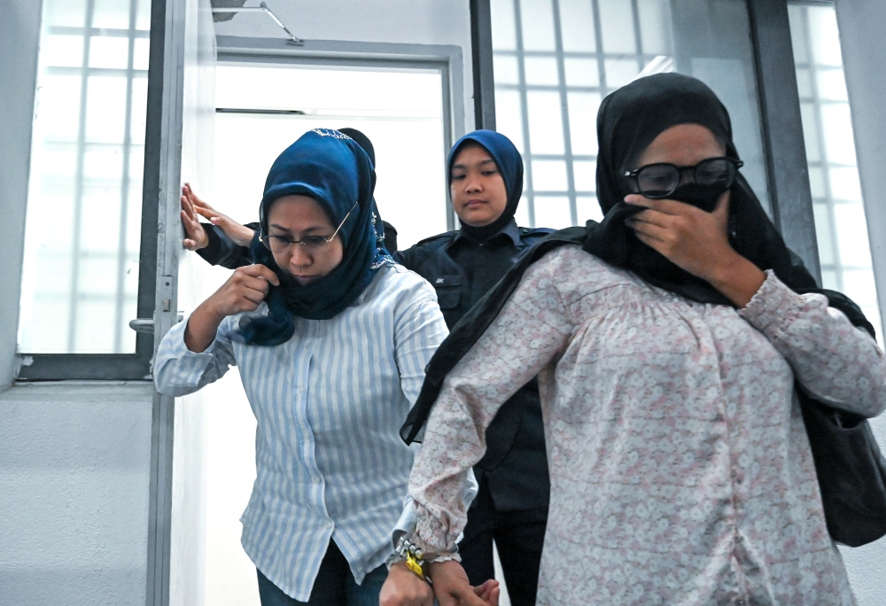 Two women charged with defrauding Perak retiree of RM120,000 through bogus tax demands