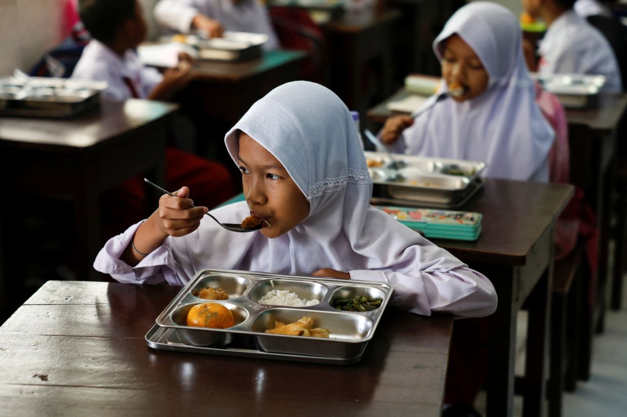 Indonesia's Education Law Revision Sparks Debate Over Free Meals Funding